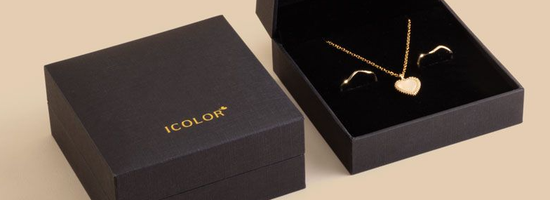 A beautiful custom jewelry box next to a generic one, showing the difference in perceived value