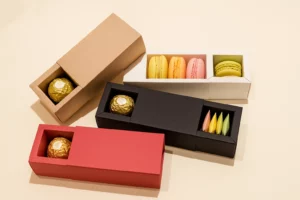 Gourmet drawer box packaging for chocolates, macarons, and tea bags, featuring a food-safe compartment design and elegant sliding tray structure.