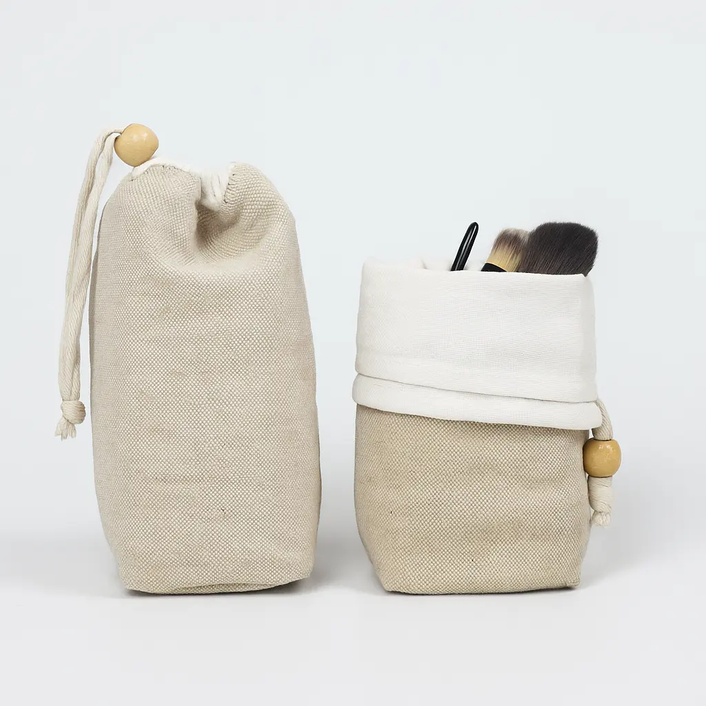 Flat lay of clean factory workspace with organized fabric samples and tools, representing ethical and audited production standards.