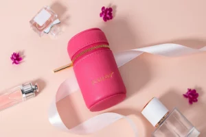 Pink PU leather travel perfume case designed for mini fragrance bottles and vials.