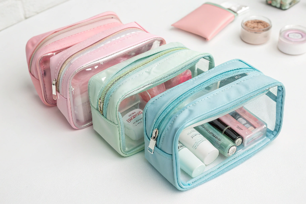 A collection of modern cosmetic bags showcasing modular design, clear materials, and trendy colors