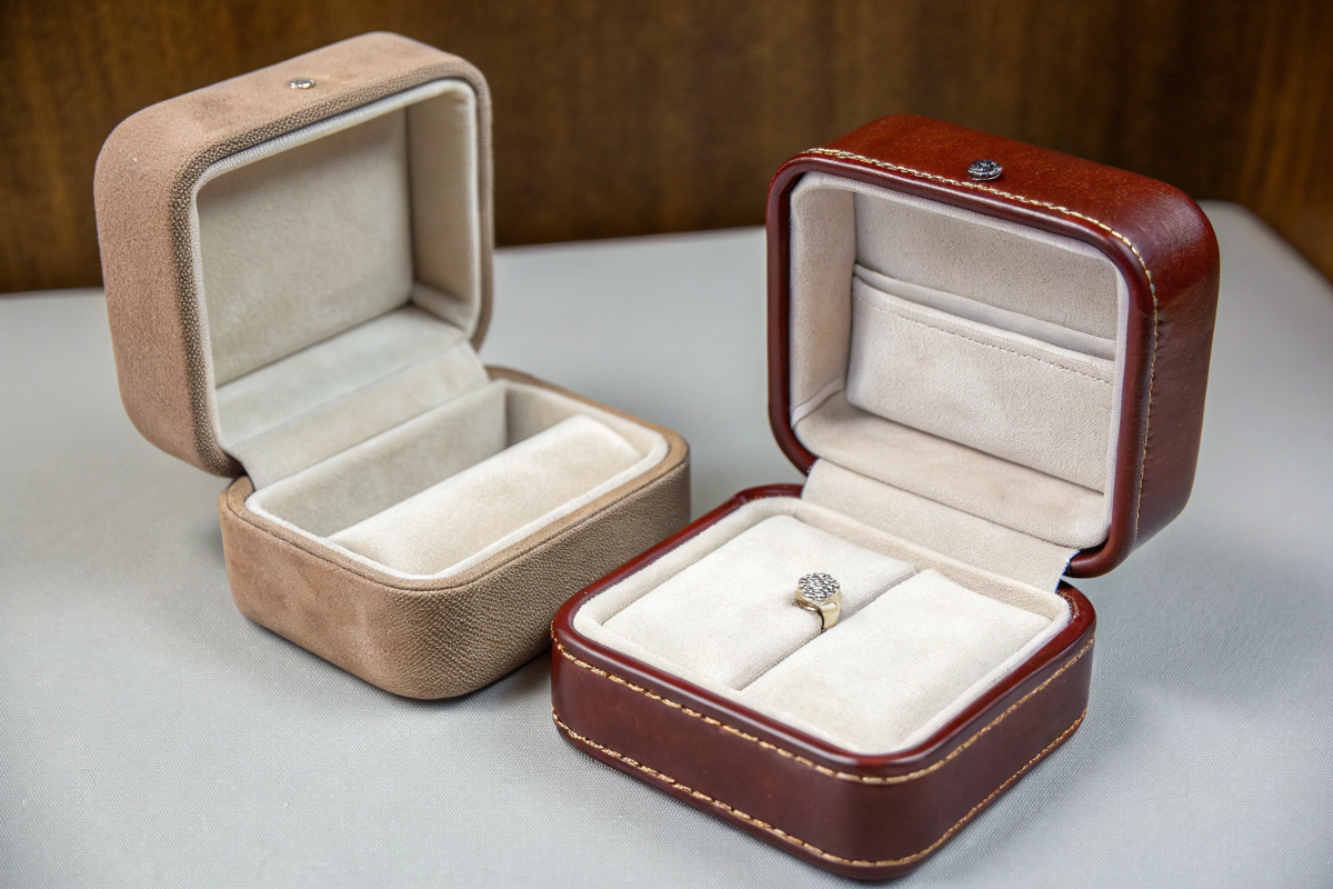 a custom-designed ring box with unique inserts and an elegant opening mechanism