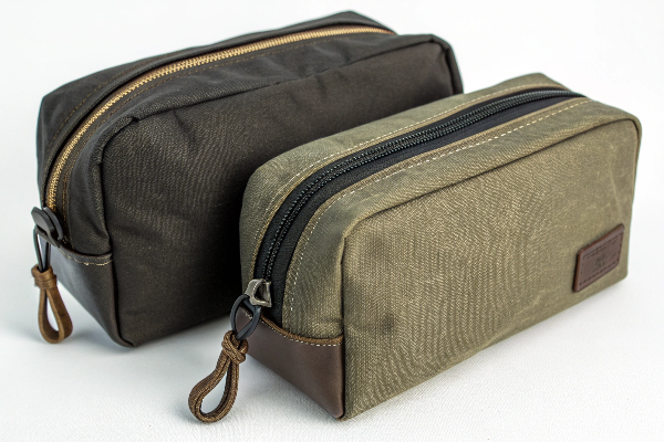 A sturdy canvas makeup bag and a lightweight nylon makeup bag