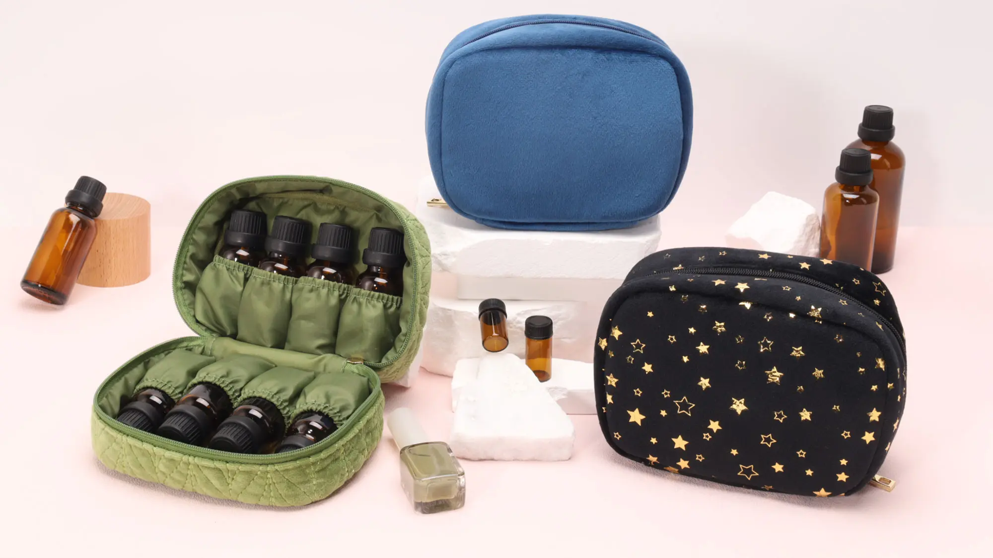 Flat lay of organic skincare bottles next to raw linen and hemp pouches