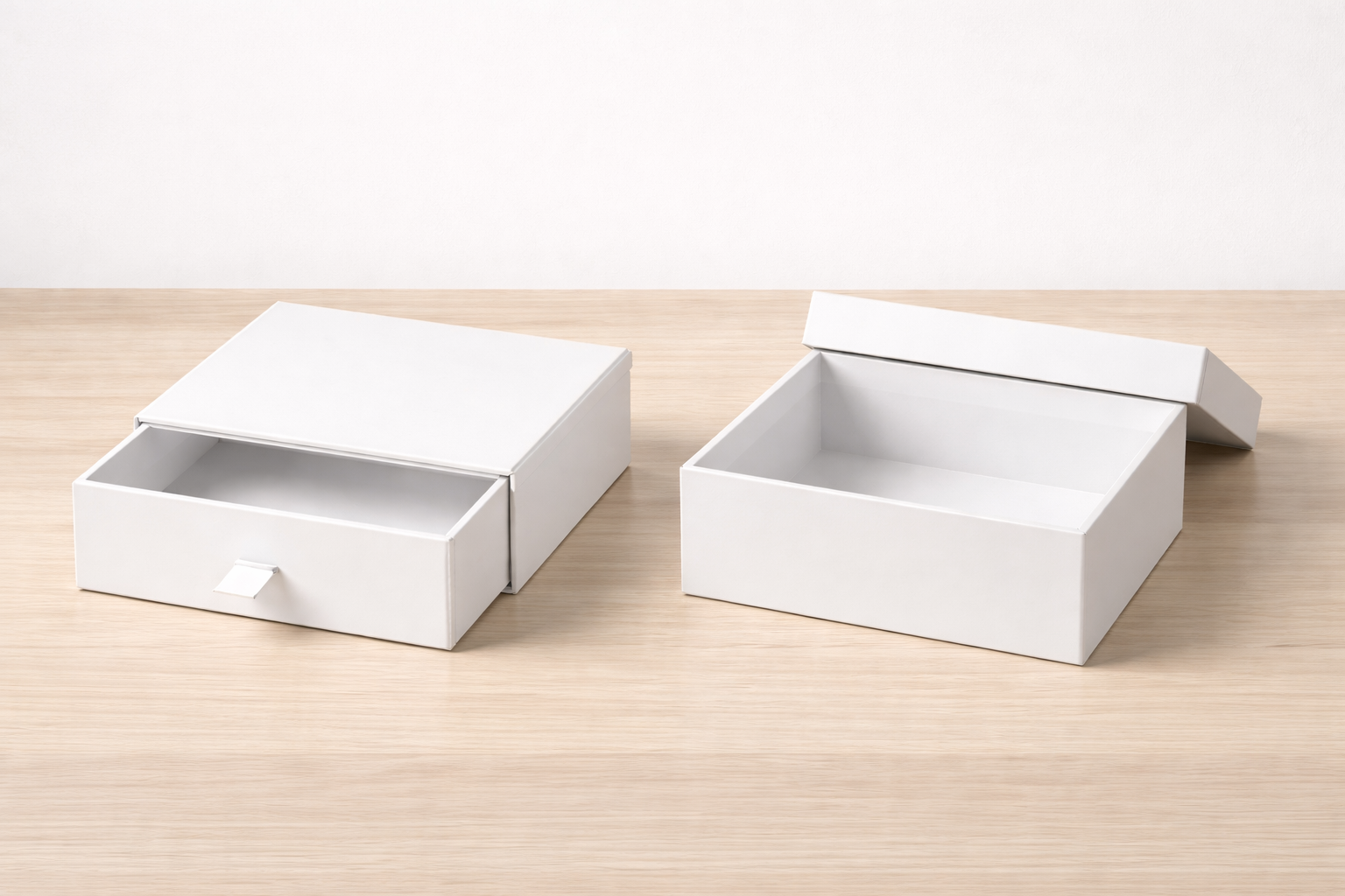 drawer box next to a lift-off lid box for comparison