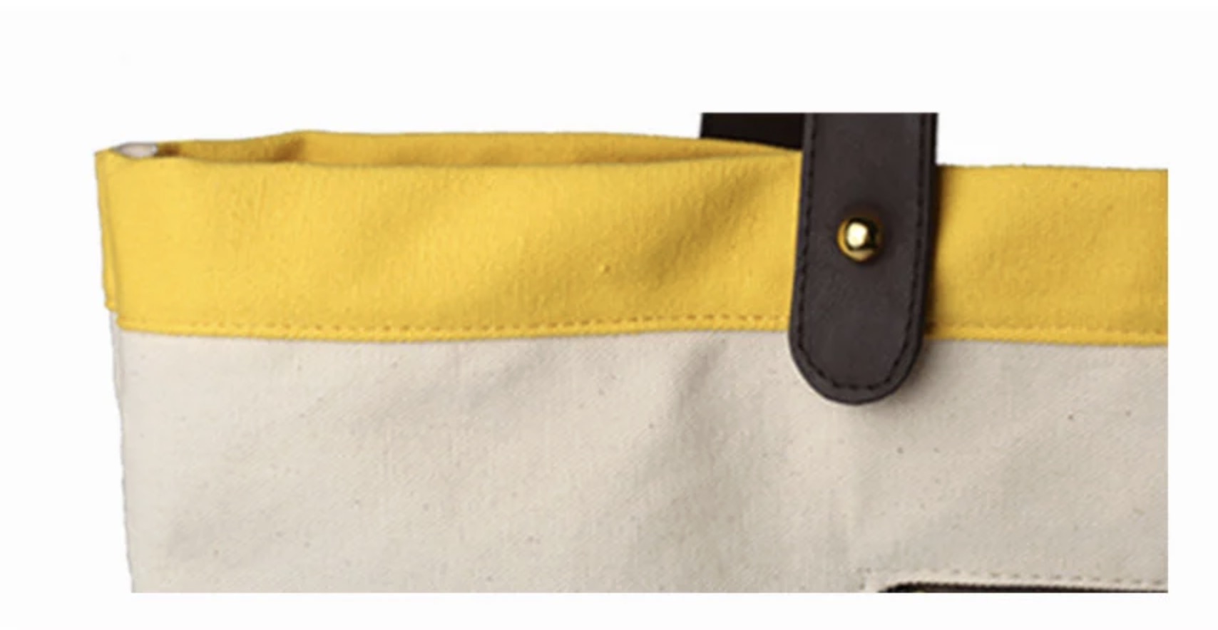 Close up of unbleached cotton texture with seed flecks