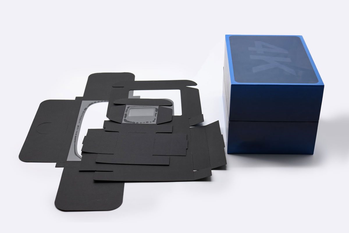 Collapsible rigid boxes stacked flat for warehouse handling